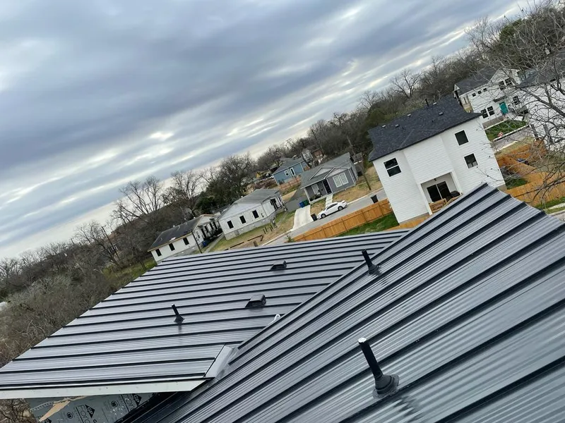 Standing seam metal roof panels with vents for Skylight Repair in Tecumseh